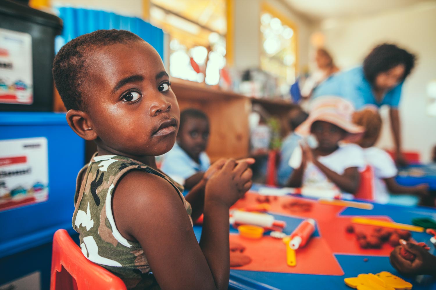 Kids in class using educational toys.