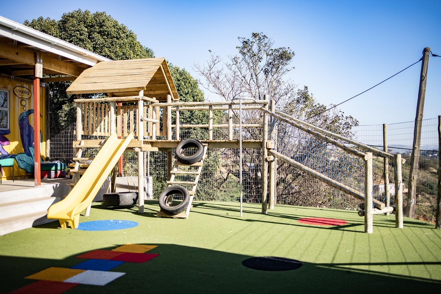 Phase 5 installation of artificial turf.