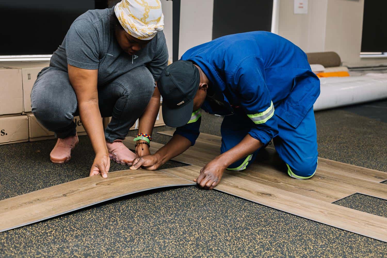 Learning vinyl tile installation.