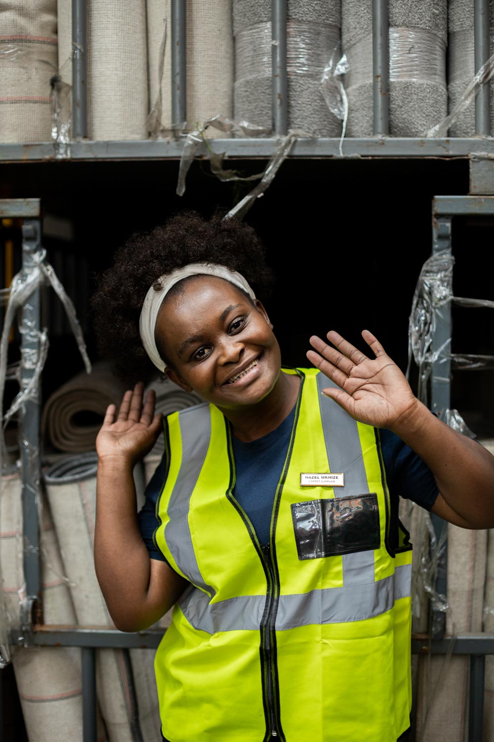 Hazel in the rug vendor warehouse.