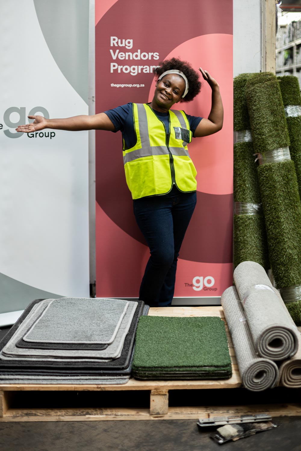 Hazel collecting her order from the Belgotex factory.